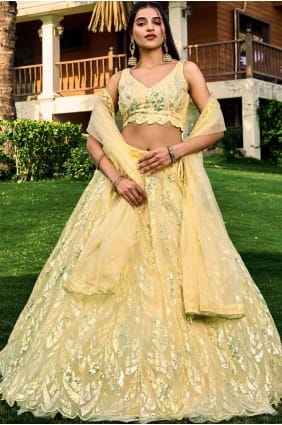 Soft net Yellow Lehenga Choli in Embroidered LC7859