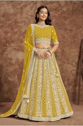 embroidered faux georgette lehenga choli in yellow LC8173