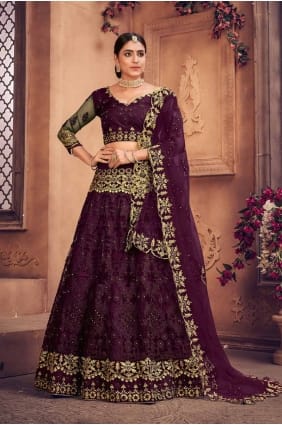 net wedding lehenga choli with embroidered in purple LC8232