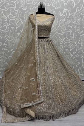 Lehenga Choli de mariée dorée en filet avec pierre et motif LC8275